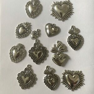 Lot of silver colored heart charms / pendants / jewelry making